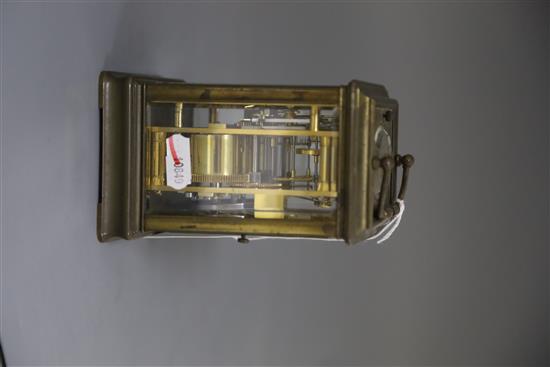 A late 19th century French lacquered brass hour repeating carriage clock, width 3.5in. depth 3.25in. height 5.5in.